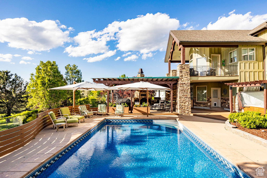 View of pool with a patio area