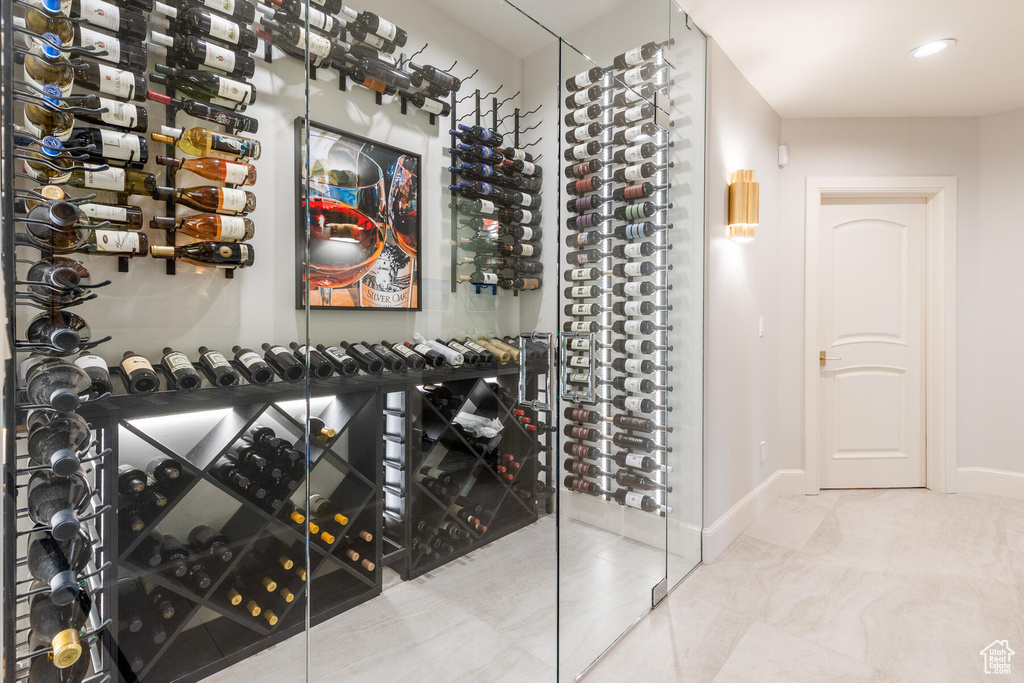 Wine room featuring tile floors