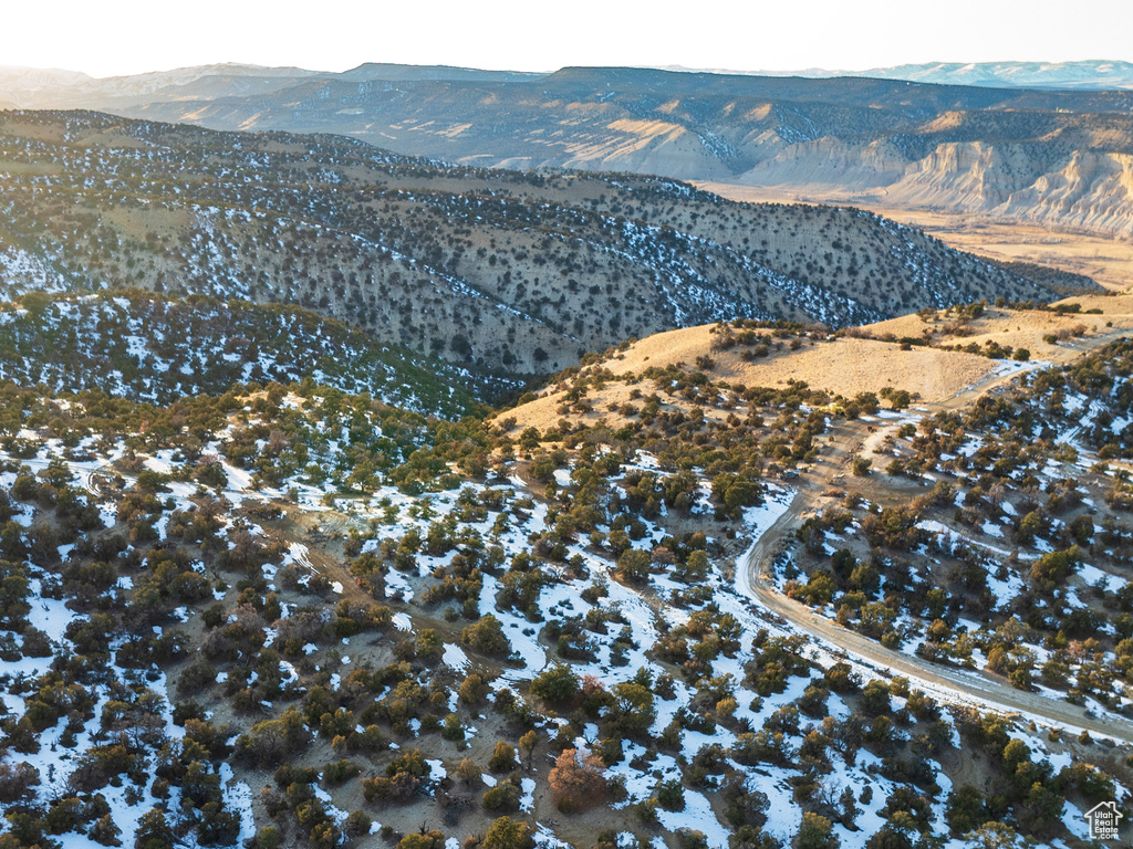 Snowy aerial view with a mountain view