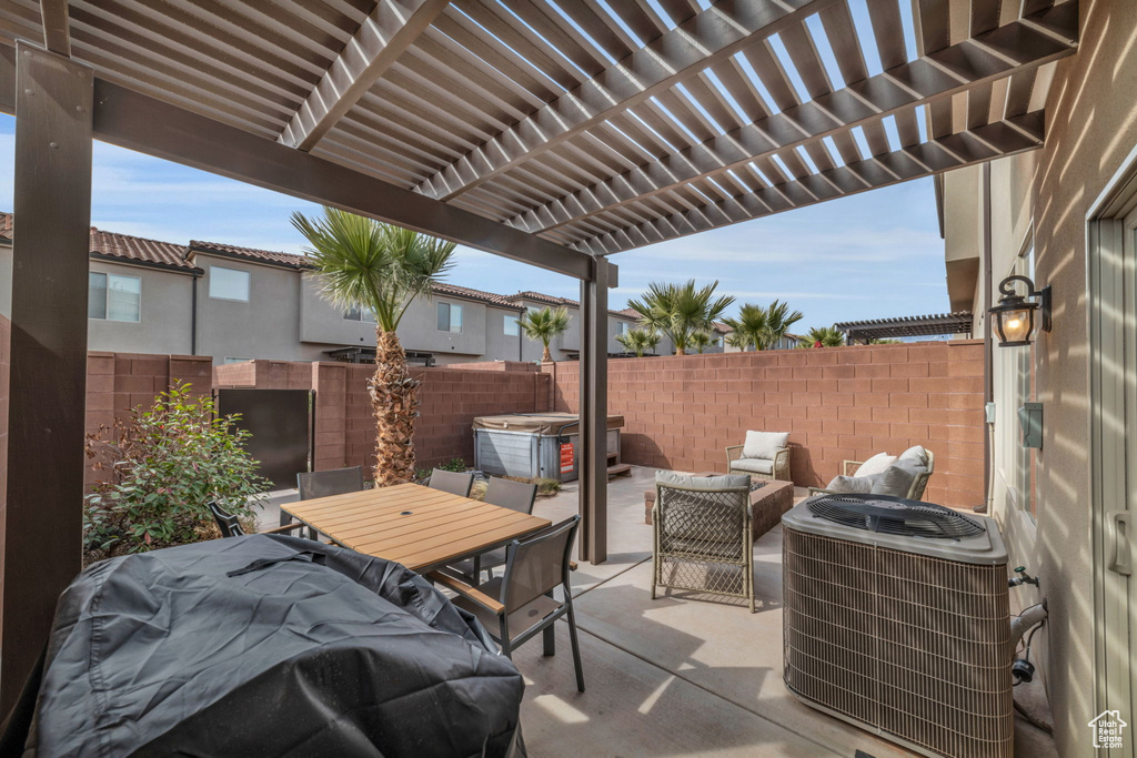 View of patio featuring a pergola and central AC unit
