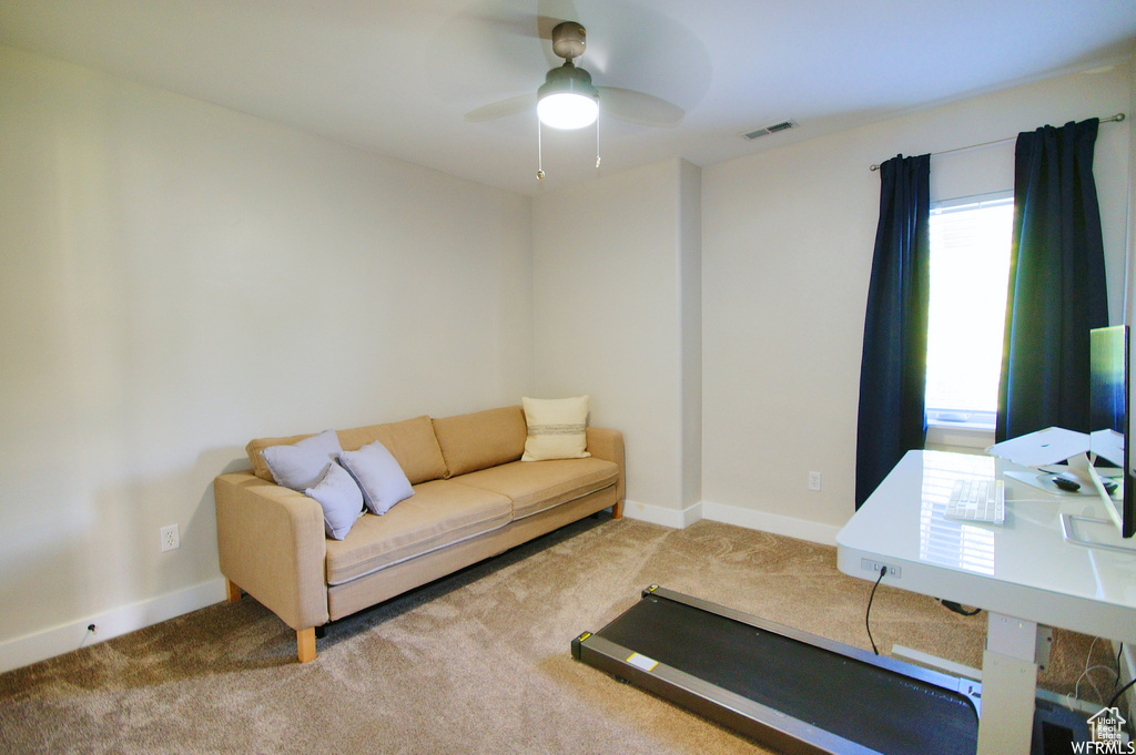 Interior space featuring ceiling fan