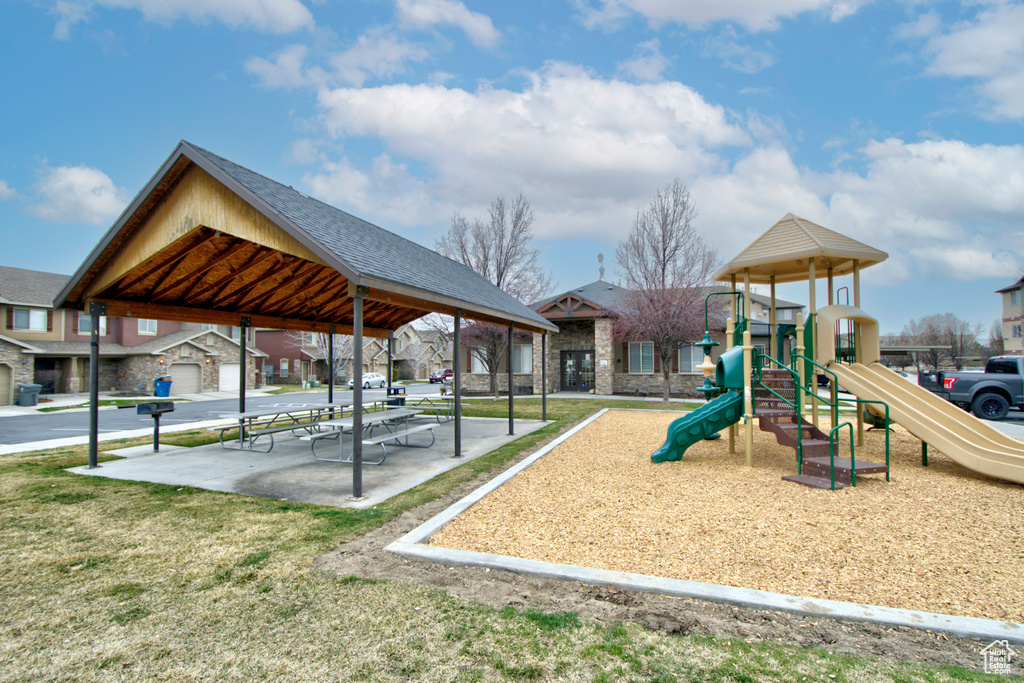 View of playground featuring a yard