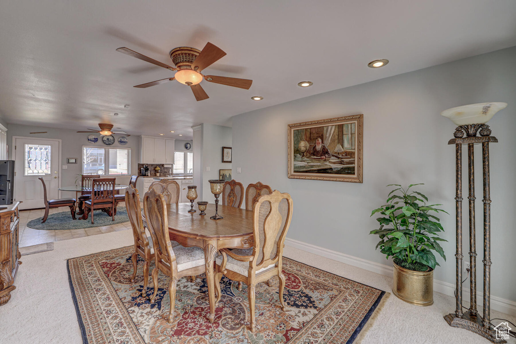 Dining area with ceiling fan