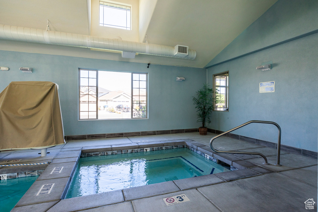 View of pool featuring an indoor hot tub