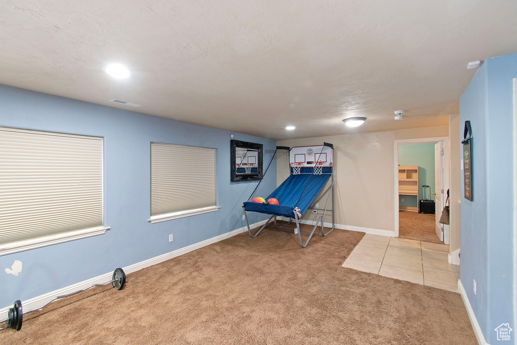 Playroom with light colored carpet
