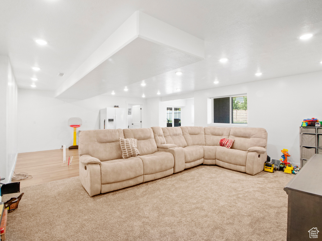 Living room with light colored carpet