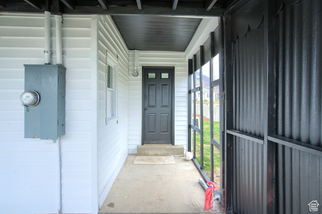 Entrance to property with a porch