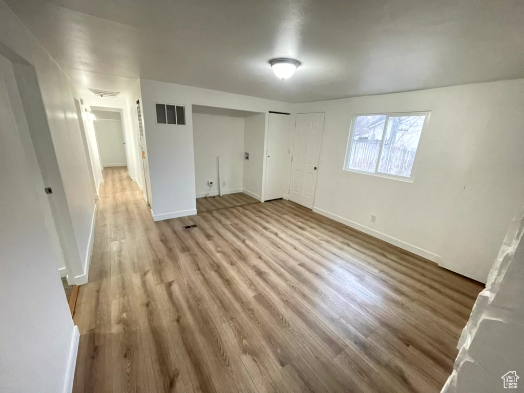 Unfurnished bedroom featuring light hardwood / wood-style flooring