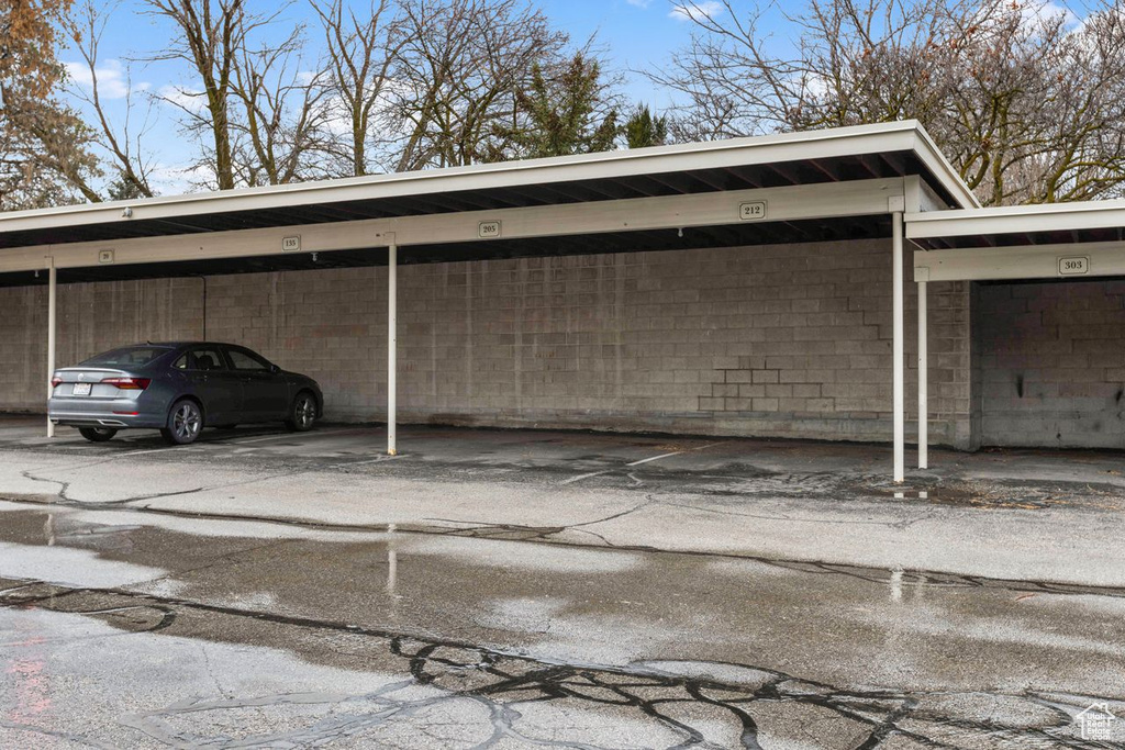 View of vehicle parking with a carport