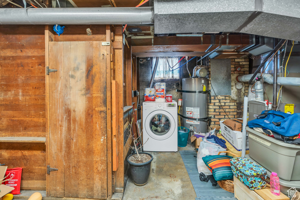 Basement featuring washer / dryer and water heater