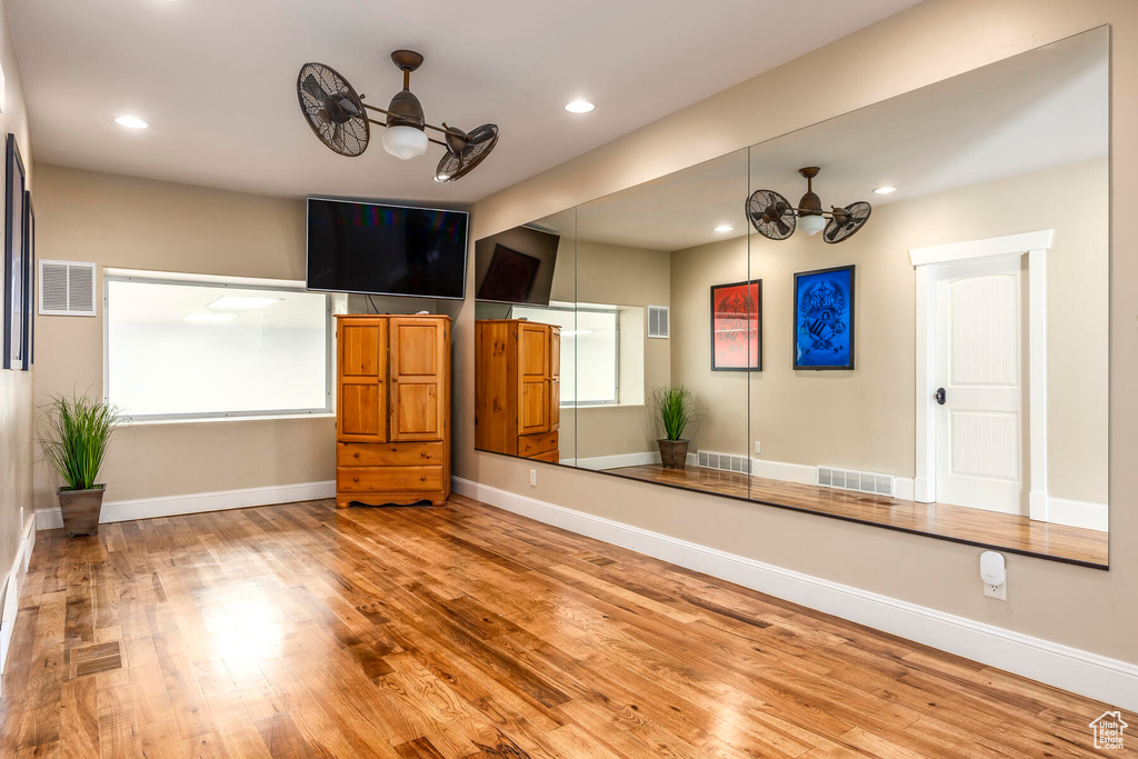 Interior space with a chandelier and wood-type flooring