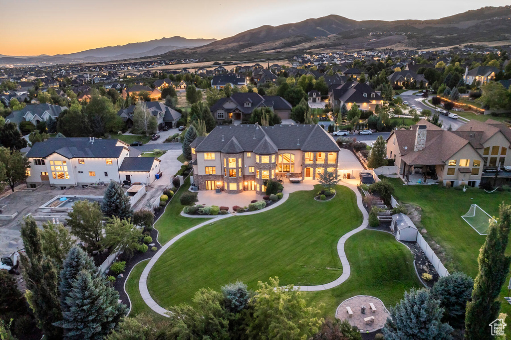 Aerial view at dusk with a mountain view