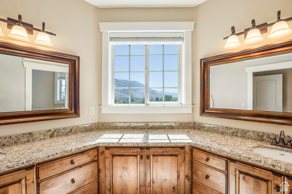 Bathroom featuring a mountain view and vanity