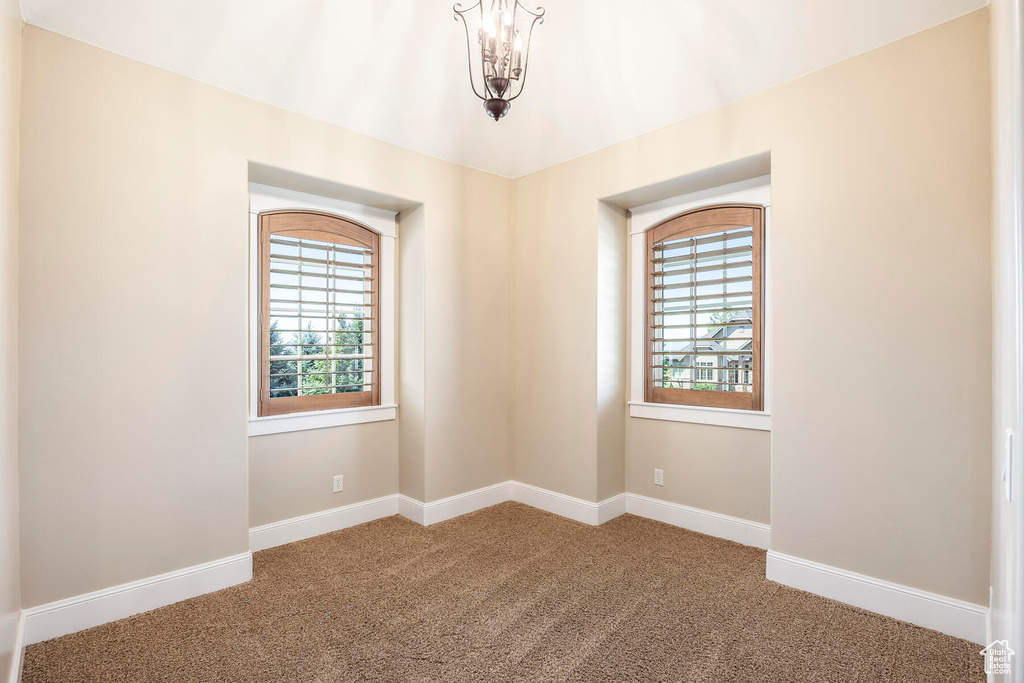 View of carpeted spare room