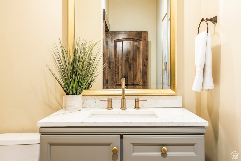 Bathroom featuring toilet and vanity