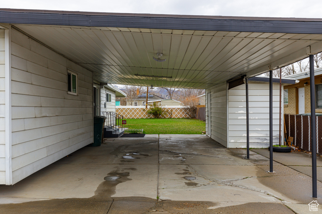 View of patio / terrace featuring a carport