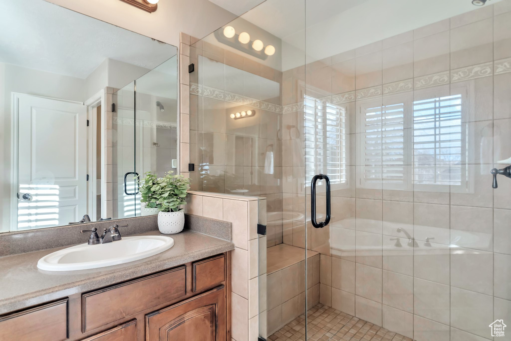 Bathroom with an enclosed shower and large vanity
