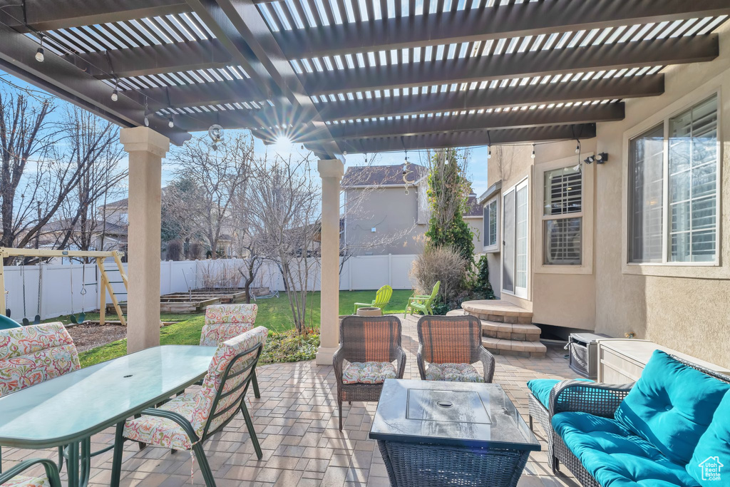 View of patio / terrace with a pergola and outdoor lounge area