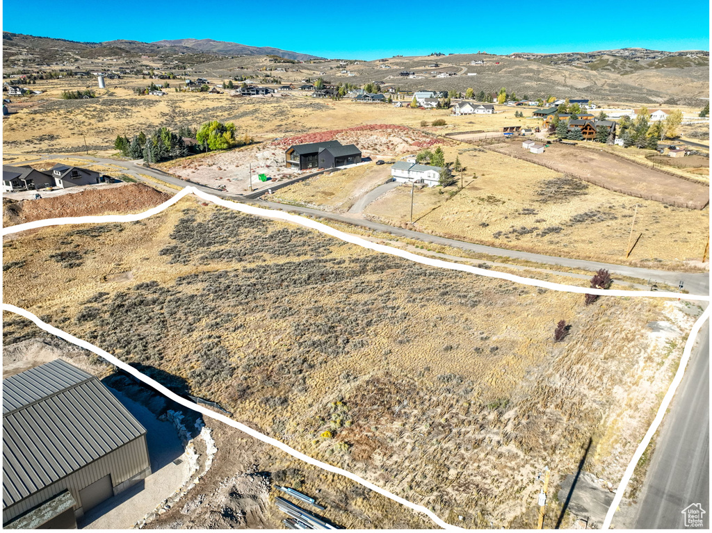 Drone / aerial view featuring a mountain view