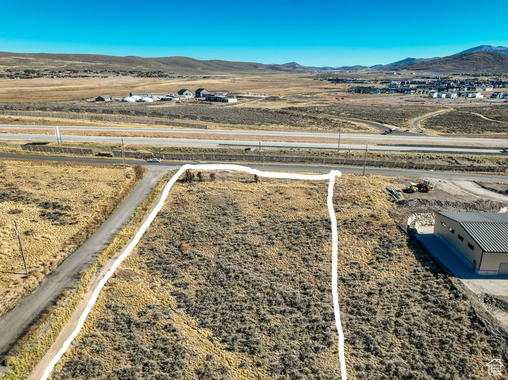 Aerial view with a mountain view and a rural view