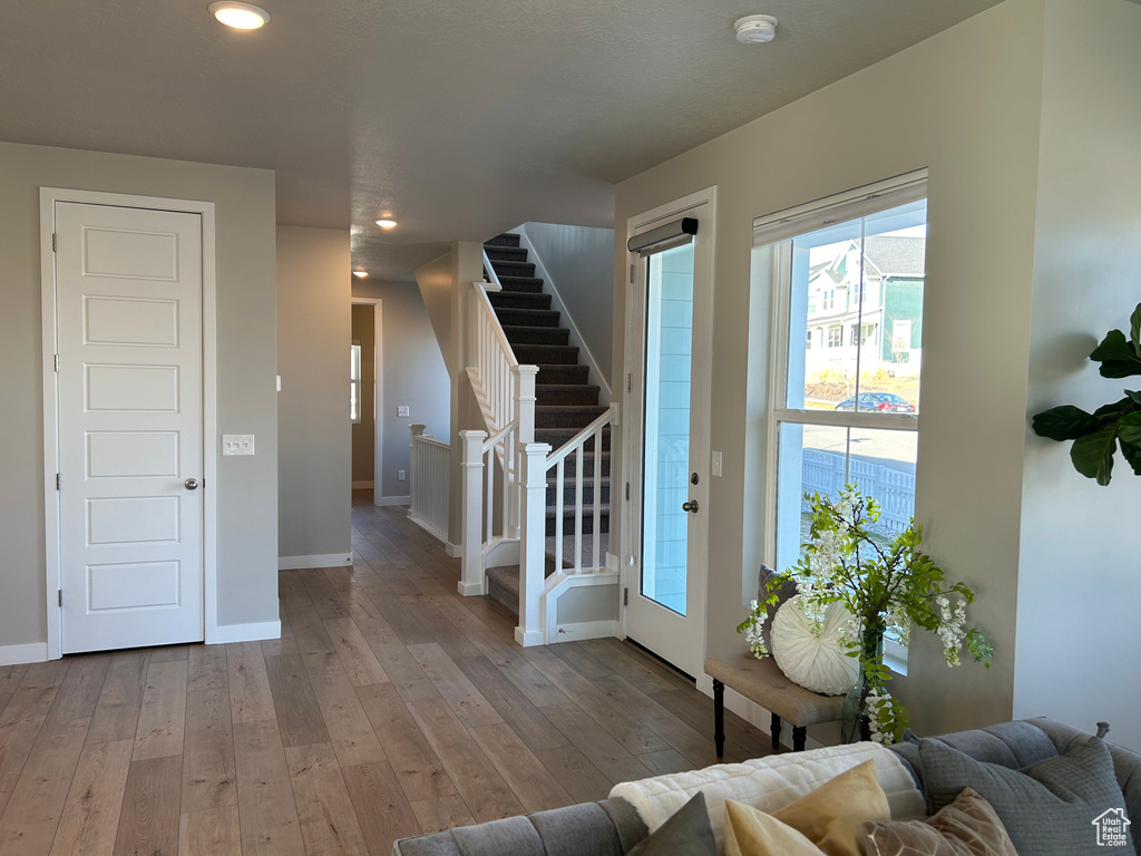 Foyer featuring hardwood / wood-style flooring