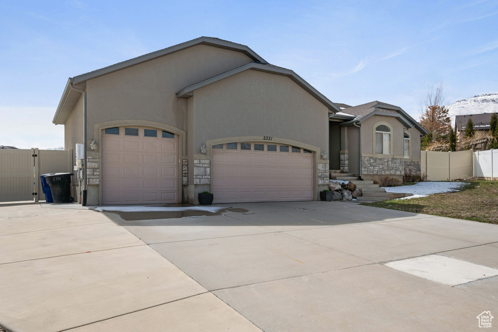 View of front of home with a garage