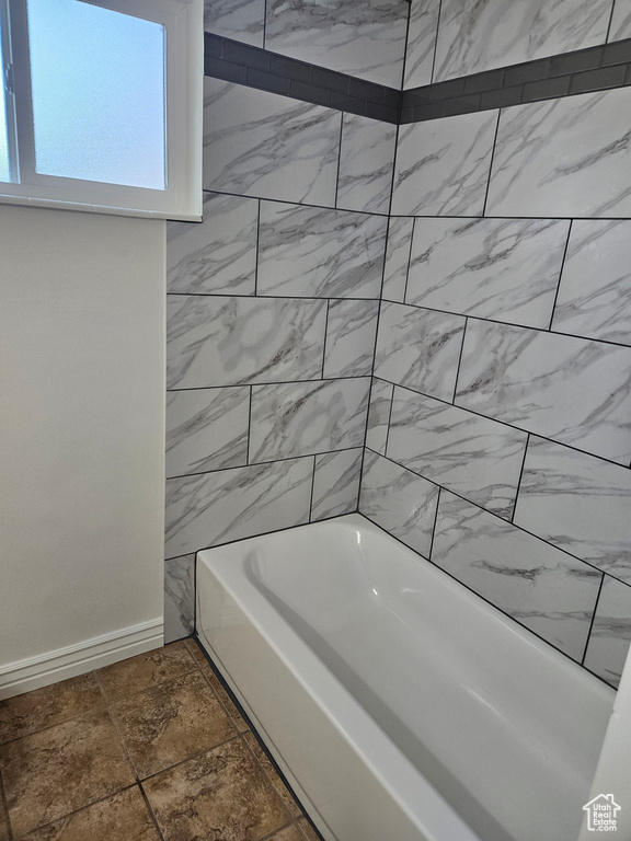 Bathroom featuring tub / shower combination