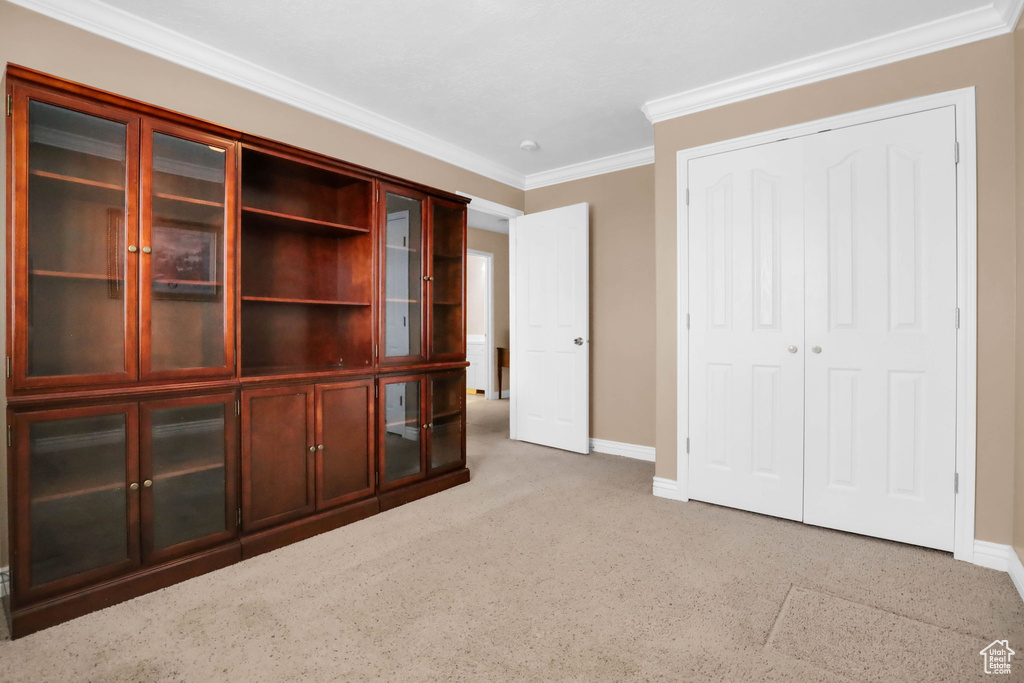 Unfurnished office featuring crown molding