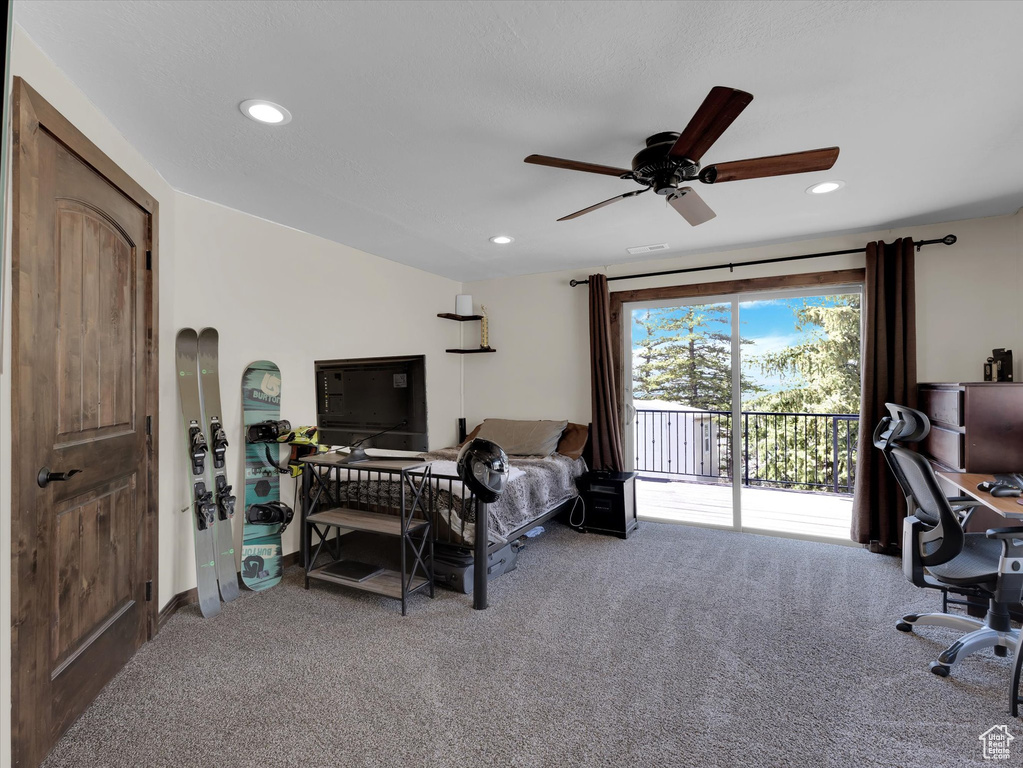 Bedroom featuring access to outside, carpet, and ceiling fan