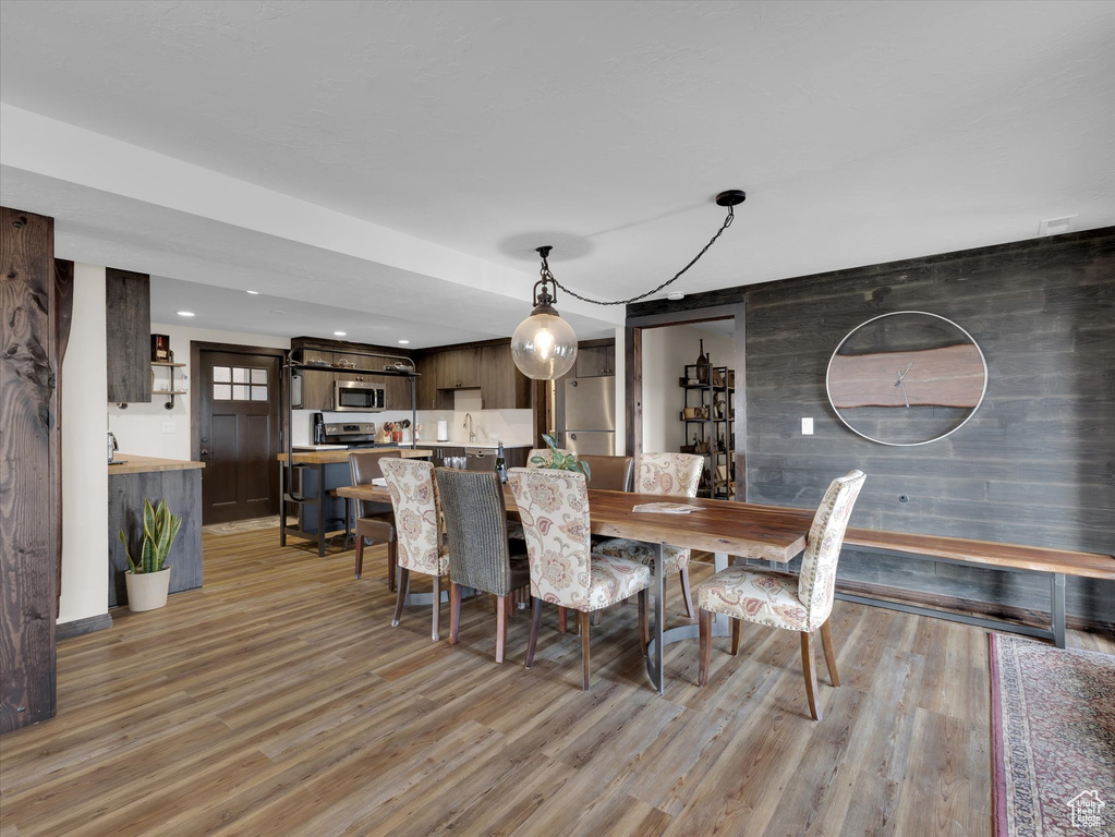 Dining area featuring hardwood / wood-style flooring