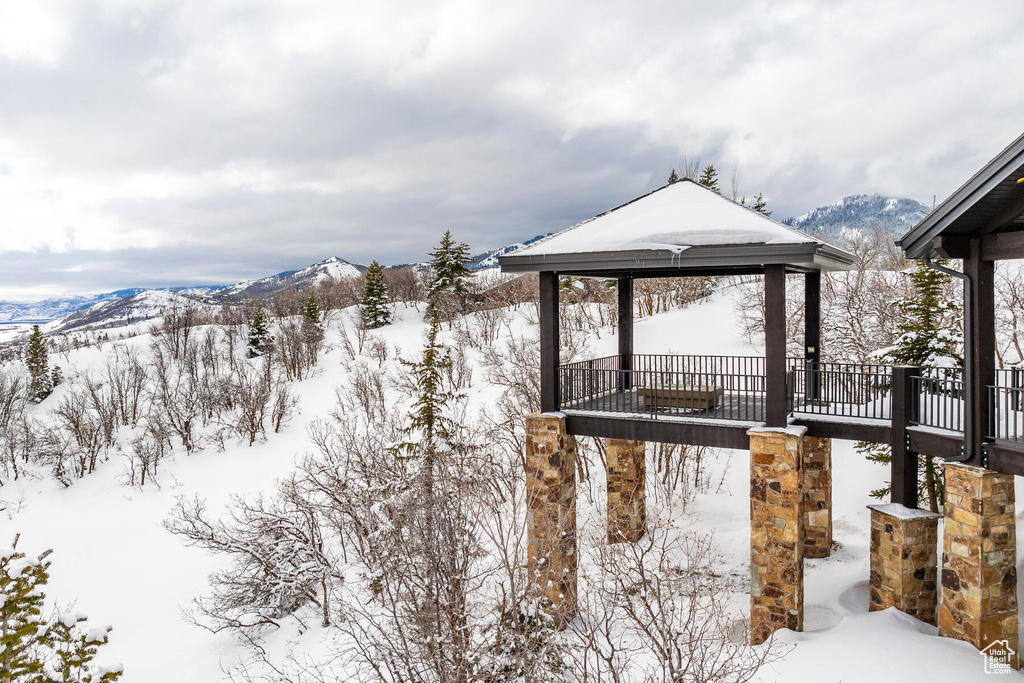 Exterior space with a mountain view and a gazebo