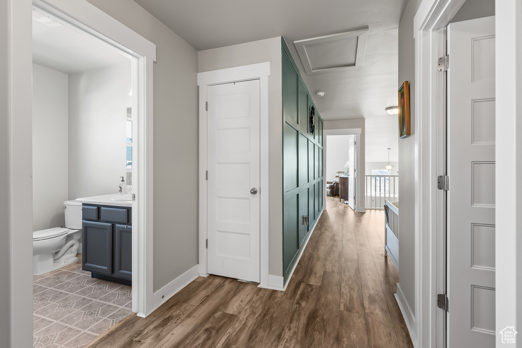 Corridor featuring hardwood / wood-style floors