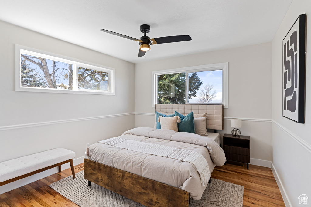 Bedroom featuring light wood-type flooring and ceiling fan