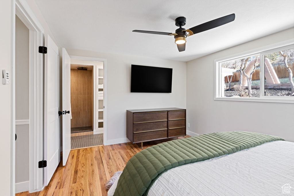 Bedroom featuring ceiling fan and light hardwood / wood-style floors