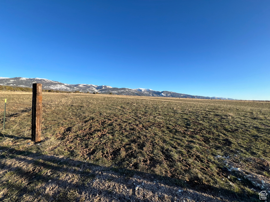 Exterior space with a rural view and a mountain view