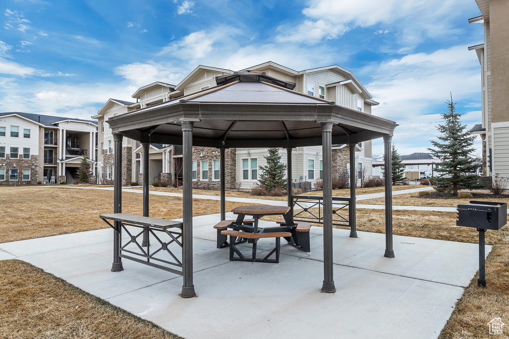 View of home\'s community featuring a patio area and a gazebo