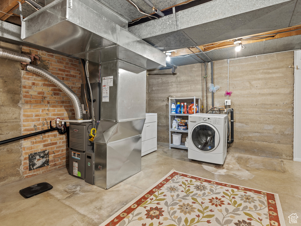 Laundry room featuring heating utilities