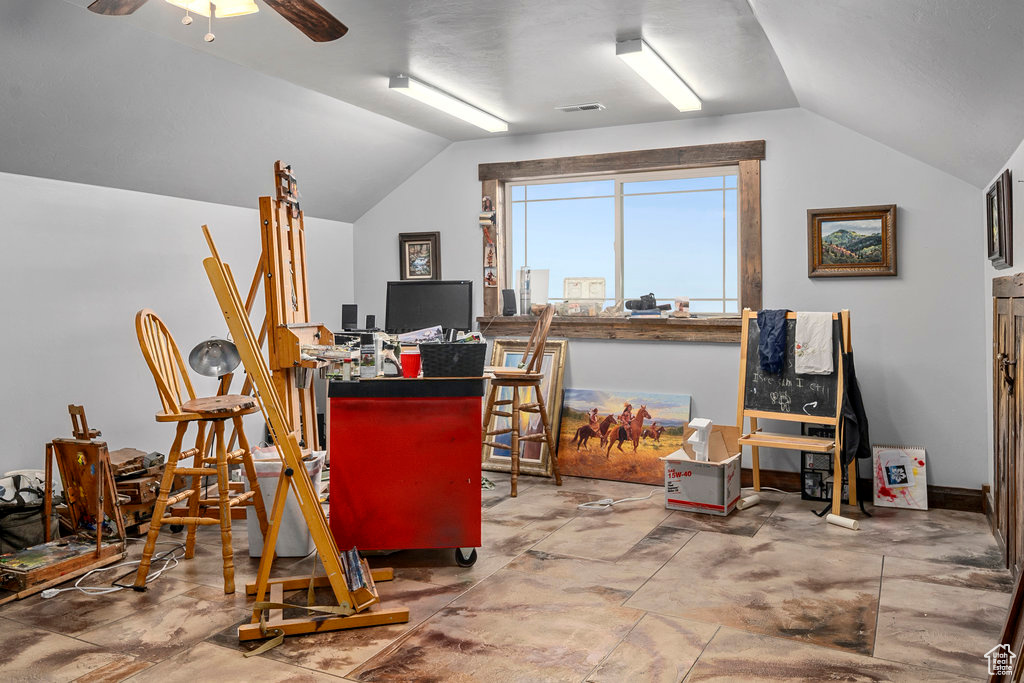 Office featuring ceiling fan and lofted ceiling