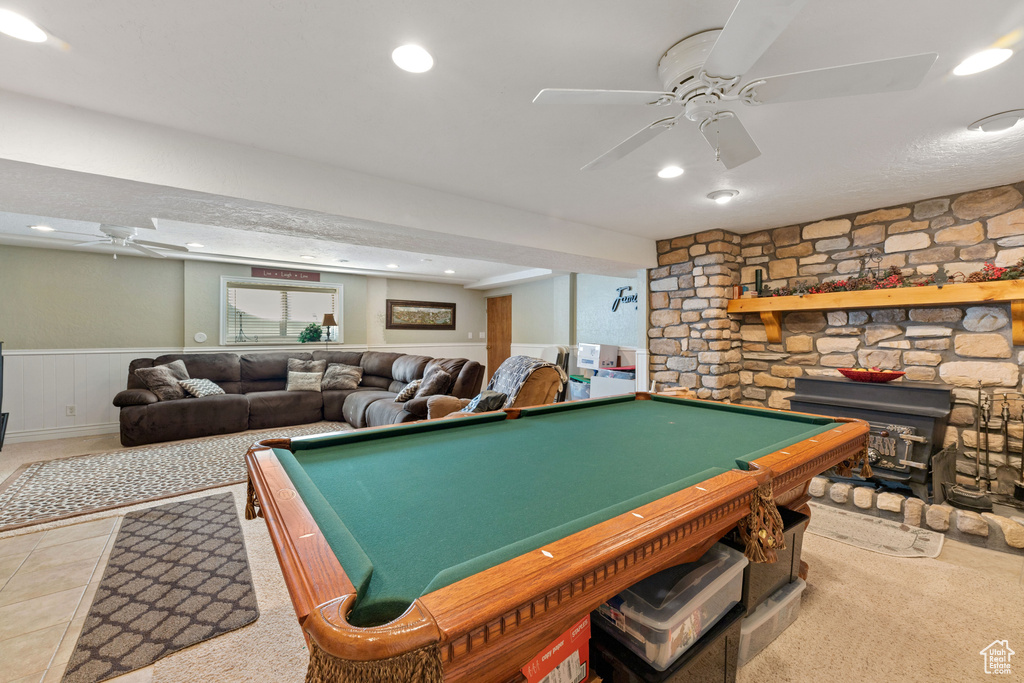 Game room featuring a fireplace, ceiling fan, and pool table