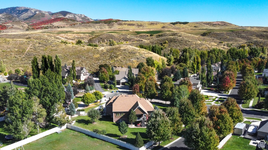 Birds eye view of property featuring a mountain view