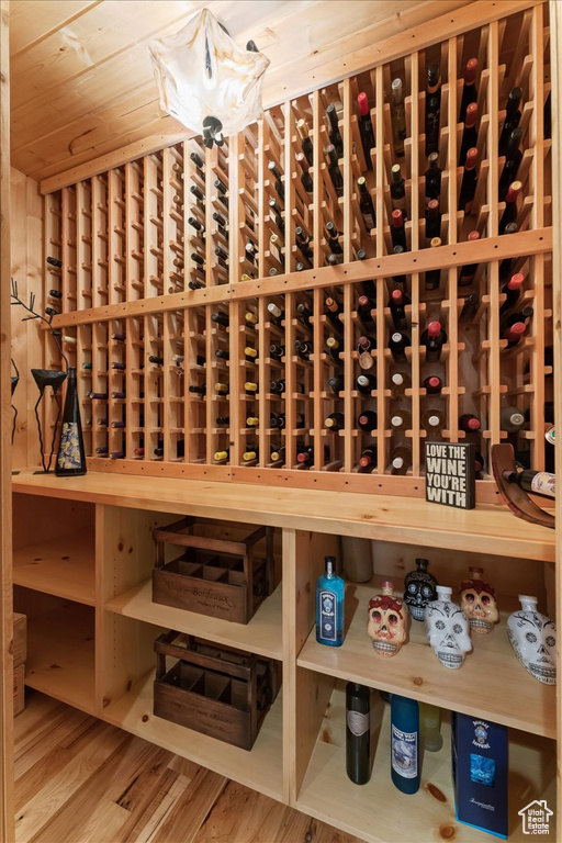 Wine cellar featuring wood ceiling