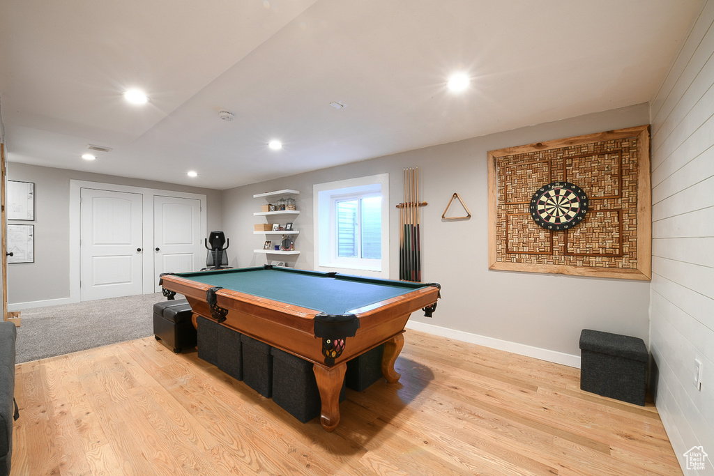 Recreation room featuring light wood-type flooring and billiards