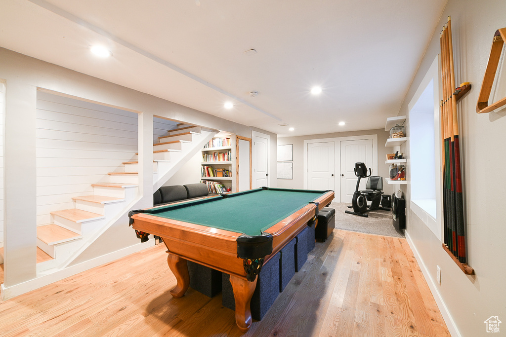 Playroom featuring light hardwood / wood-style flooring and billiards