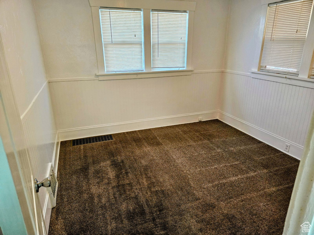 View of carpeted spare room