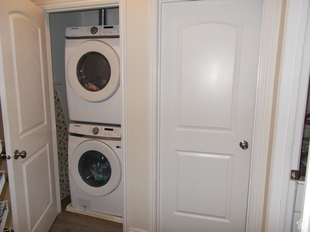 Washroom with stacked washer / dryer
