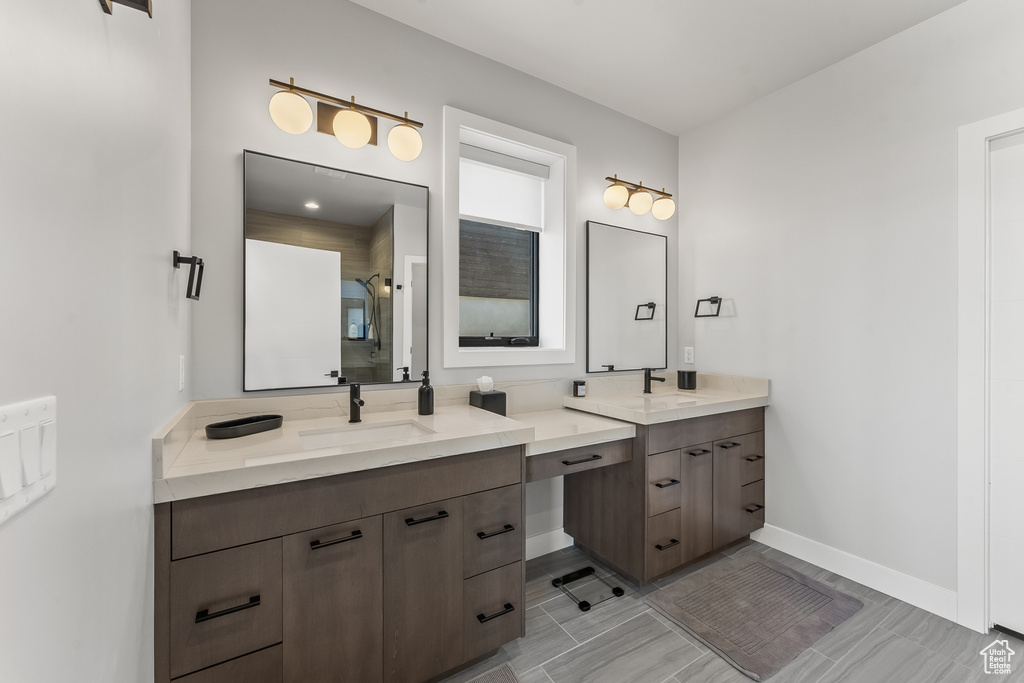 Bathroom with tile flooring and oversized vanity