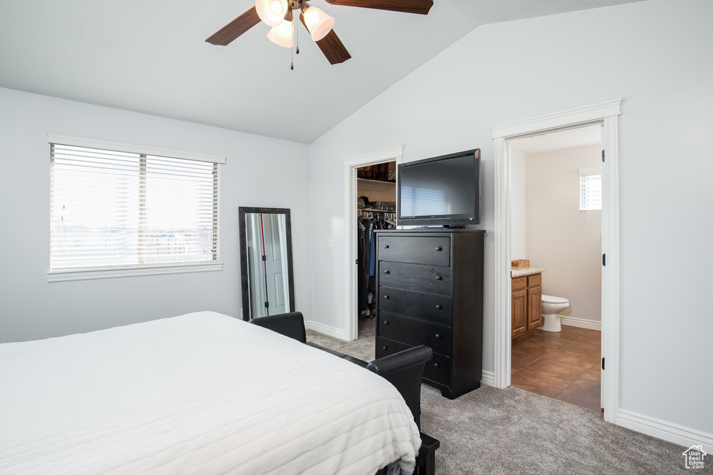 Bedroom with ceiling fan, ensuite bathroom, a closet, vaulted ceiling, and a spacious closet