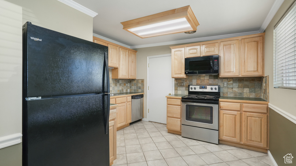 Kitchen featuring light brown cabinetry, backsplash, black appliances, and light tile flooring