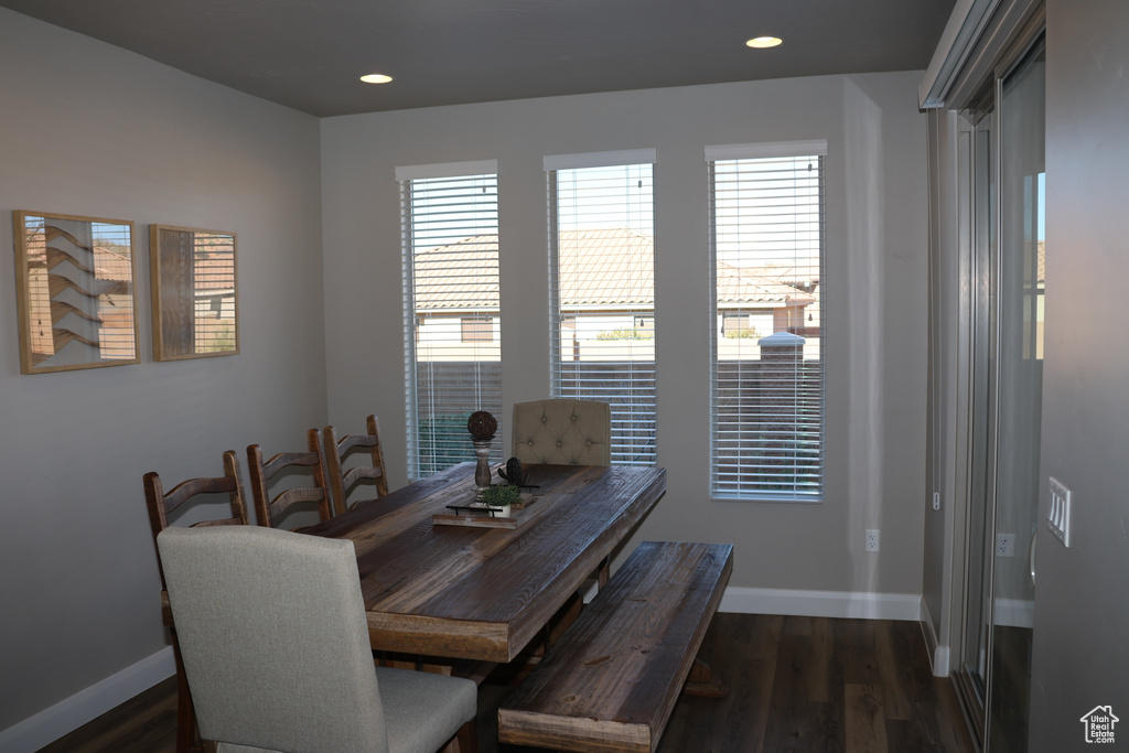 Dining area featuring dark hardwood / wood-style flooring
