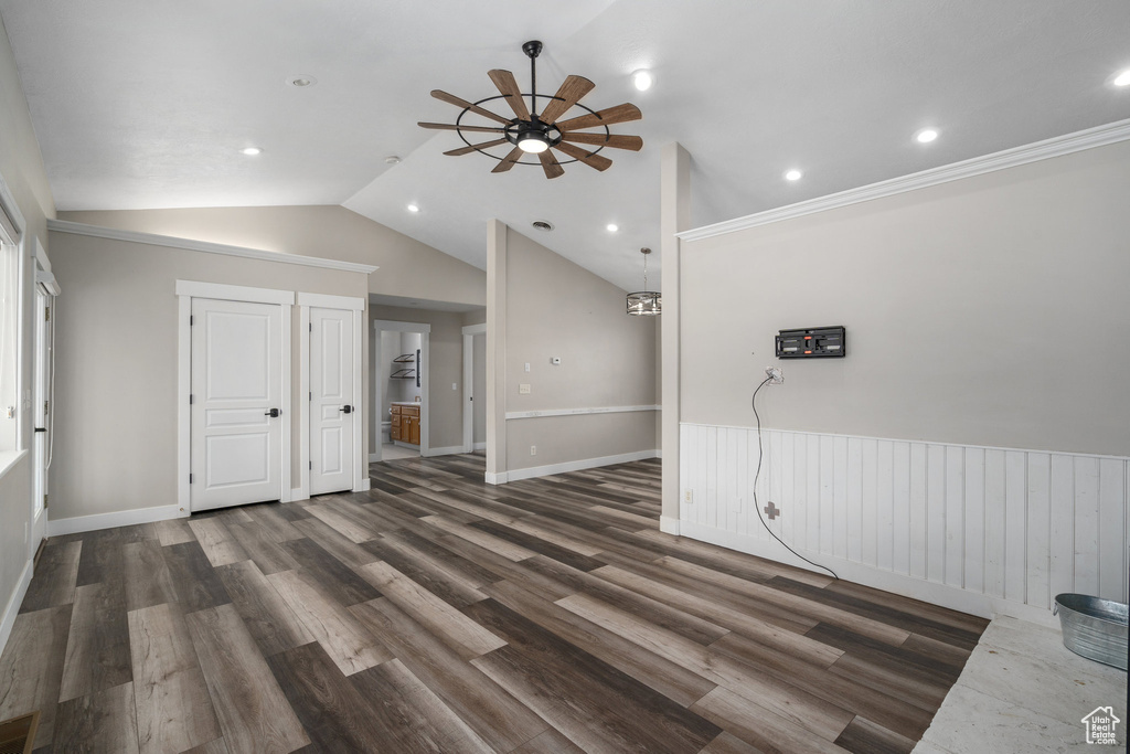Bonus room featuring ceiling fan, lofted ceiling, and dark hardwood / wood-style floors